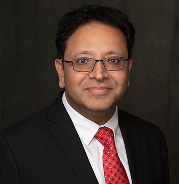 President Dr Raj Gupta | AAPIO